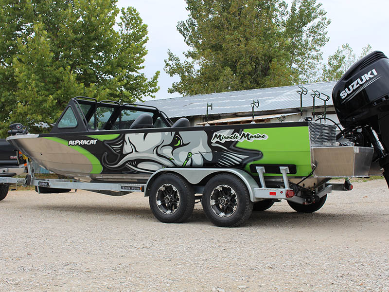 green boat on trailer