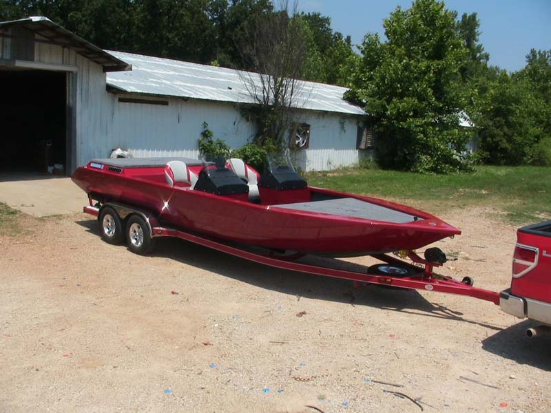 red boat on a trailer