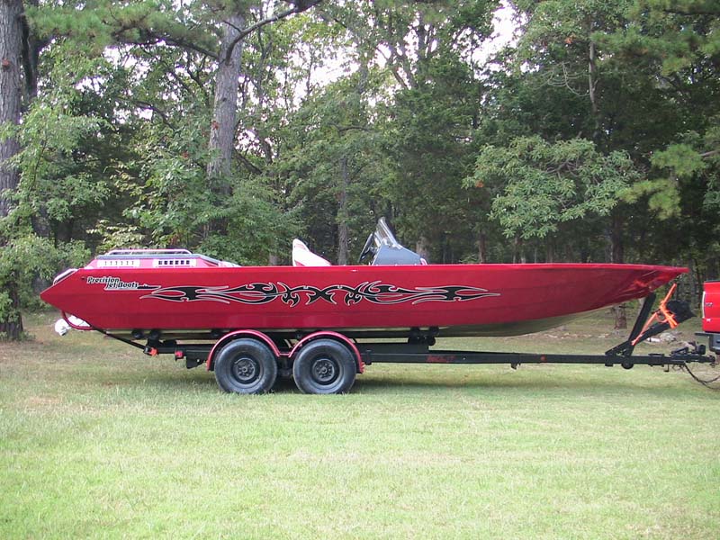 precision boats red boat on trailer