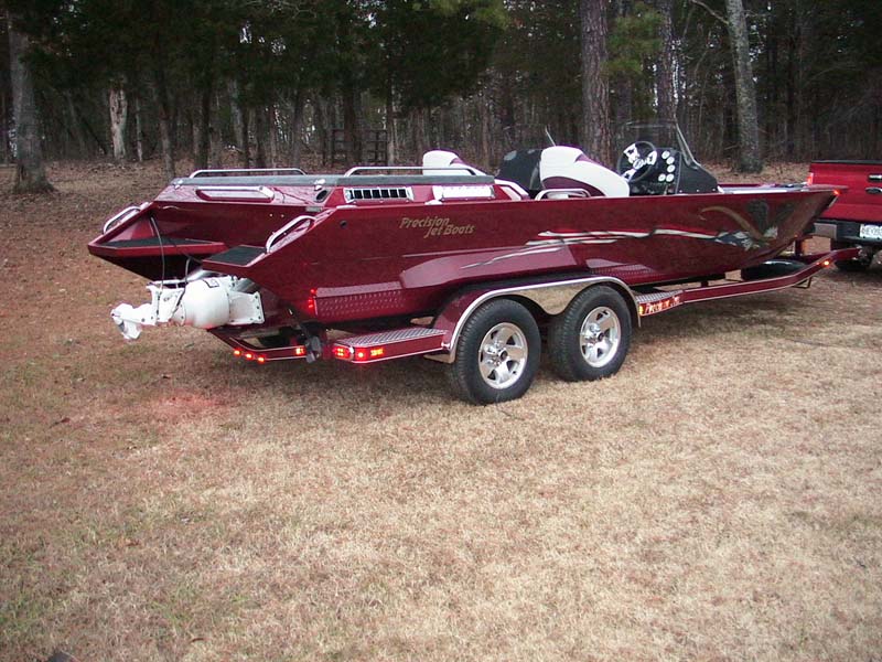 red boat on a trailer
