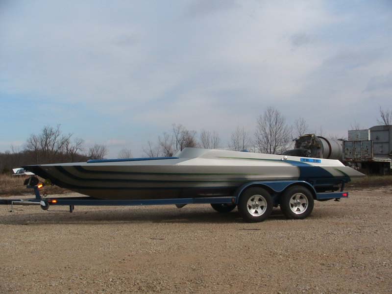 blue and gray boat side view