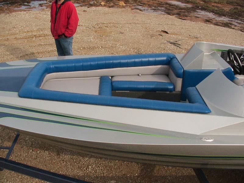 blue and gray boat front view